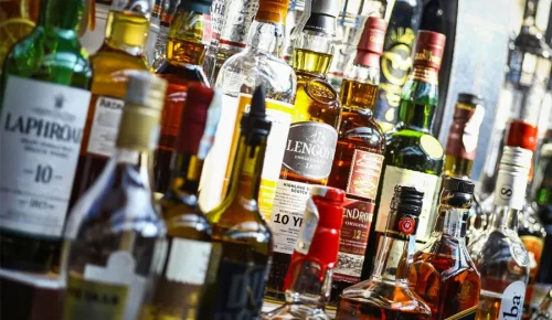 types-alcohol-shelves-Bucharest-pub-Romania